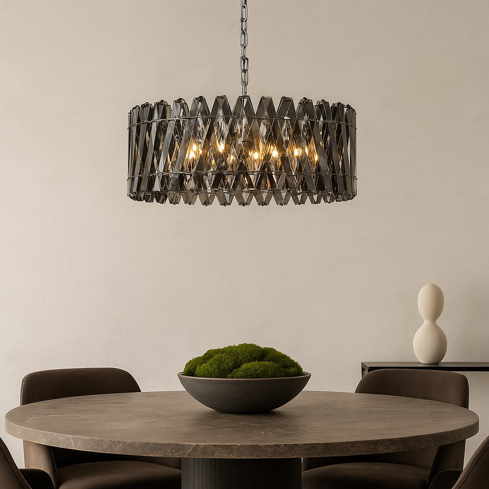 Devonport XL smoked crystal chandelier above round dining table in modern luxury interior.