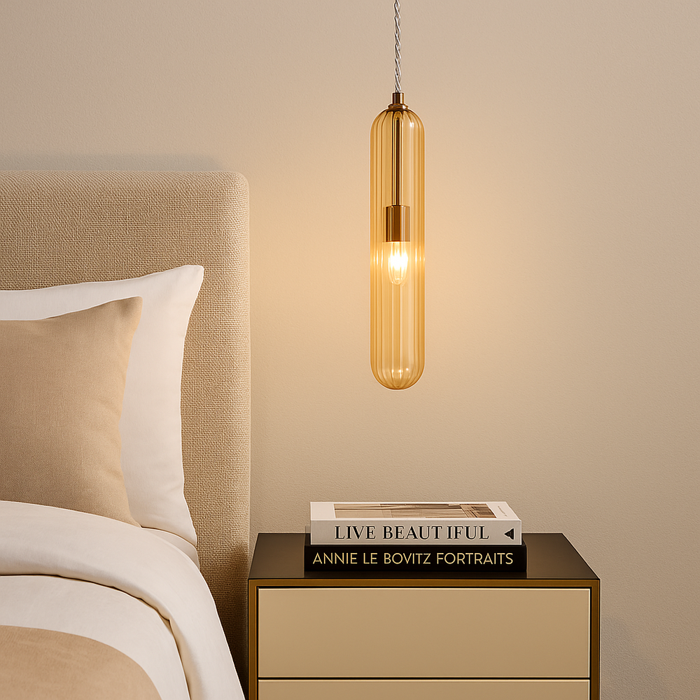 Florence gold ribbed glass pendant light above cream and gold bedside table in luxury bedroom