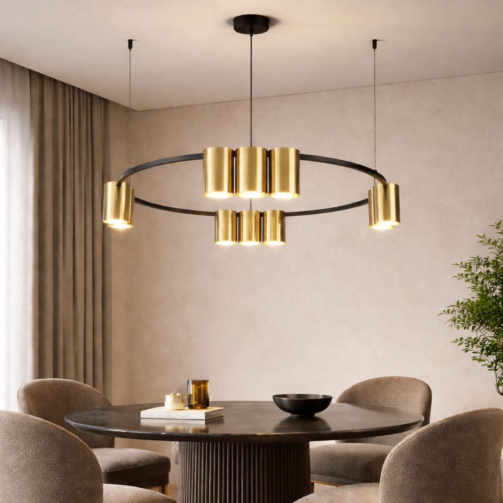 Geneva small gold pendant above round dining table

