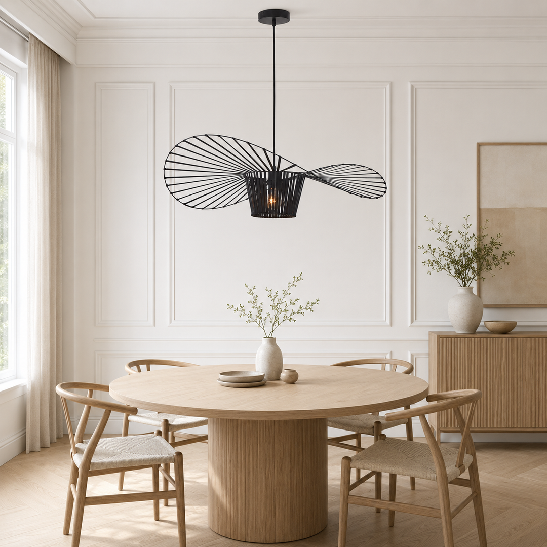 Gia XL black pendant above round dining table