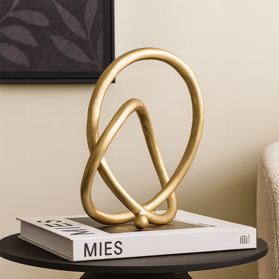 Contemporary gold decorative loop sculpture accessory for luxury interiors