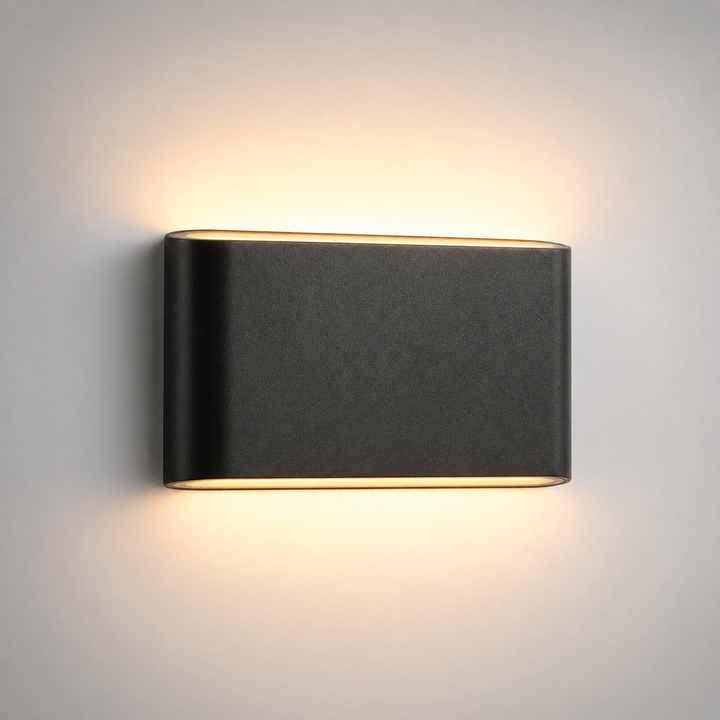 Jaca black LED wall light with up down glow