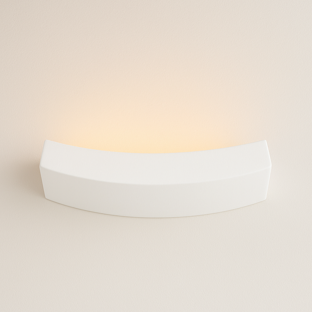 Langley wall light on off-white wall with warm glow
