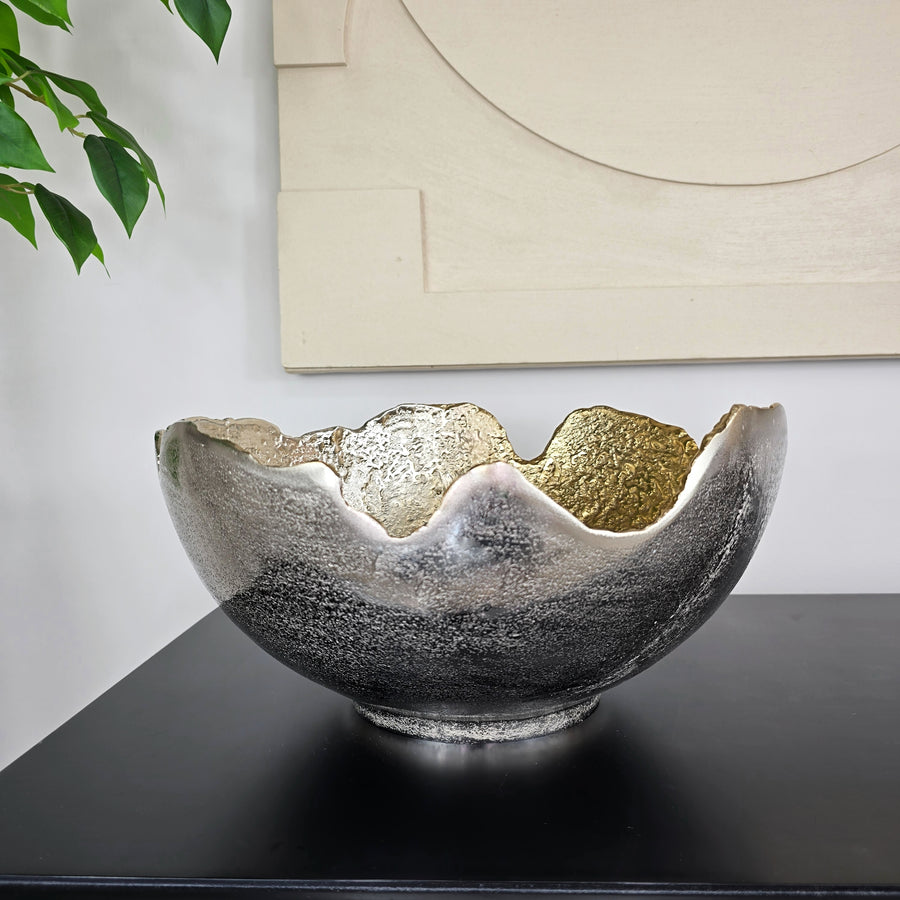 Large gold decorative bowl with two-tone nickel and gold finish styled on a modern sideboard as a luxury centrepiece