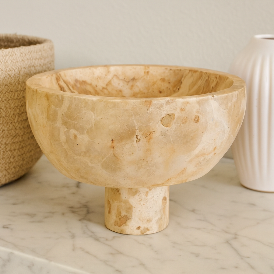 Luxury beige marble pedestal bowl on a sideboard, modern home decor accessory