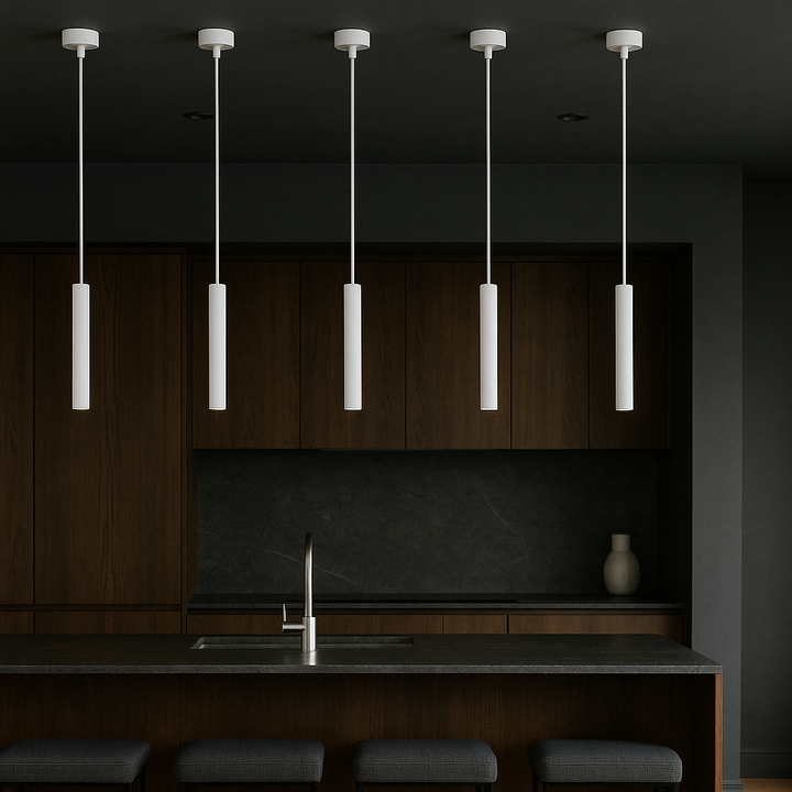 Milan white pendant lights in a modern dark Scandi kitchen with deep walnut cabinetry, charcoal stone surfaces, and a sleek island design.
