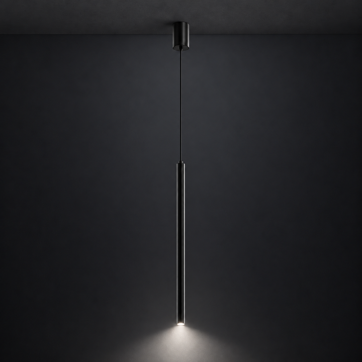Slim black cylinder pendant mounted to a charcoal ceiling, showing its 4000K white downward illumination against a dark background.
