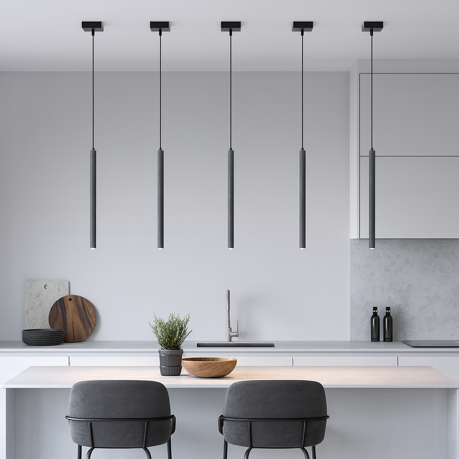 Modern kitchen with five slim concrete pendant lights over island