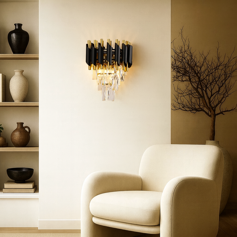 Moura wall light in polished gold and matte black with crystal glass detailing—luxury modern wall sconce.