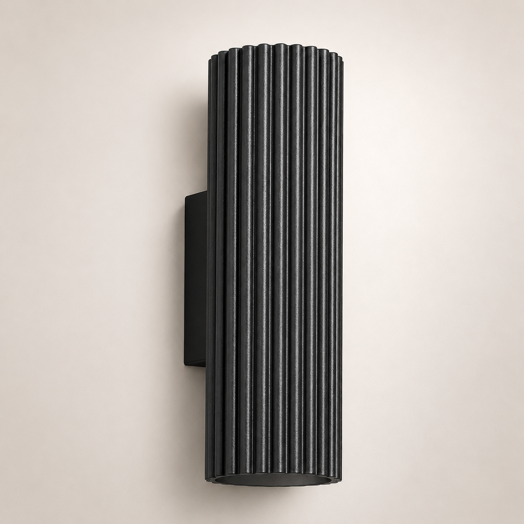 Nelson black ribbed up and down wall light.