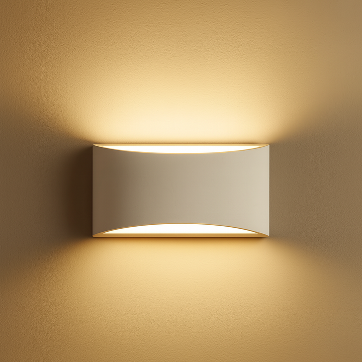 ova Lighting Batlow medium wall light in paintable ceramic plaster casting warm up and down glow on neutral wall

Would you like me to also prepare alt versions for all three Batlow sizes (small, medium, large) so they stay consistent in your collection?