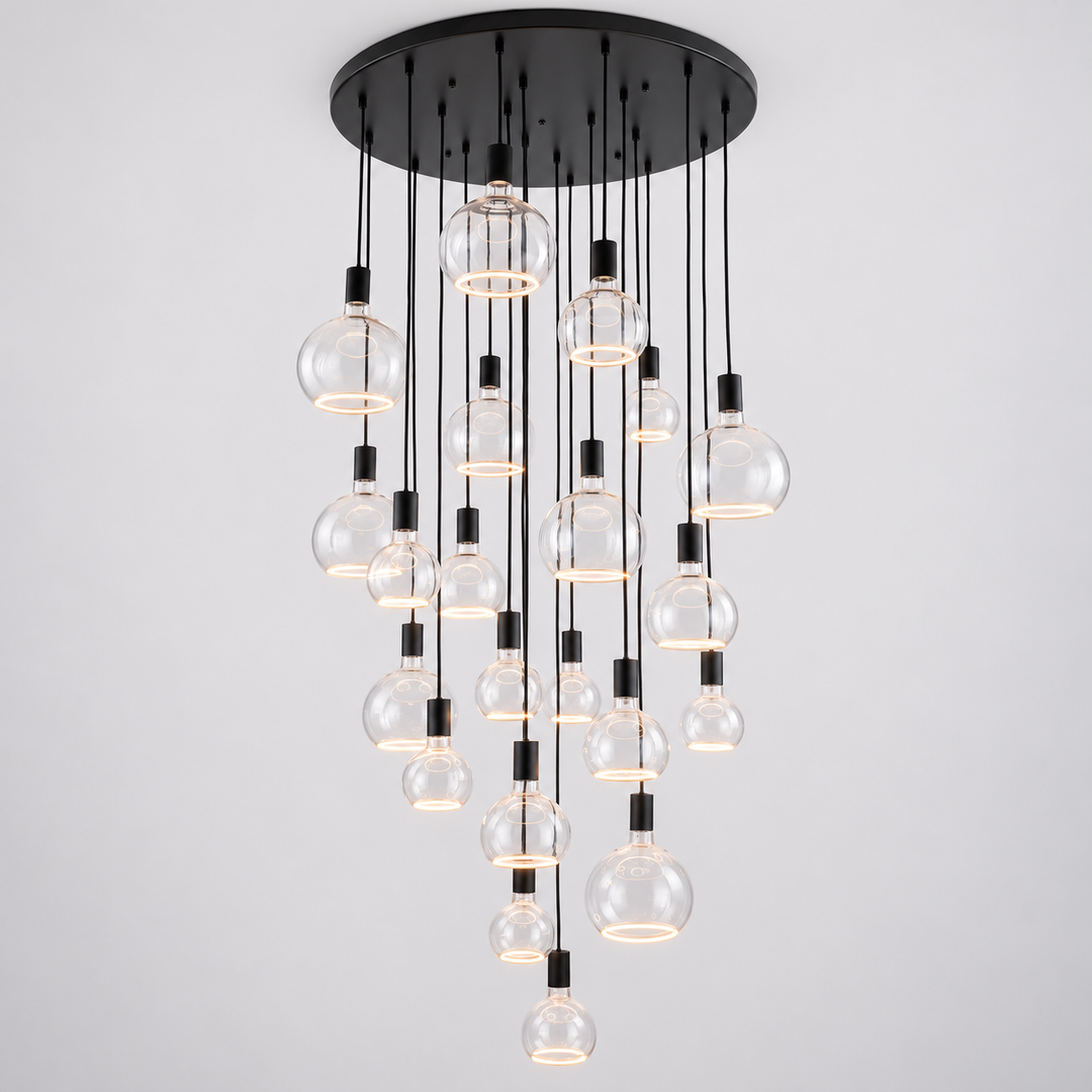 Roma 21-light black cascade pendant with clear glass halo bulbs in three sizes against a clean light background.
