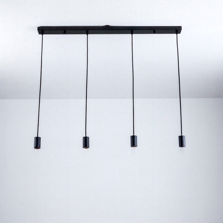 Roma 4 light black pendant bar with slim cylindrical caps and adjustable cables, shown without bulbs.