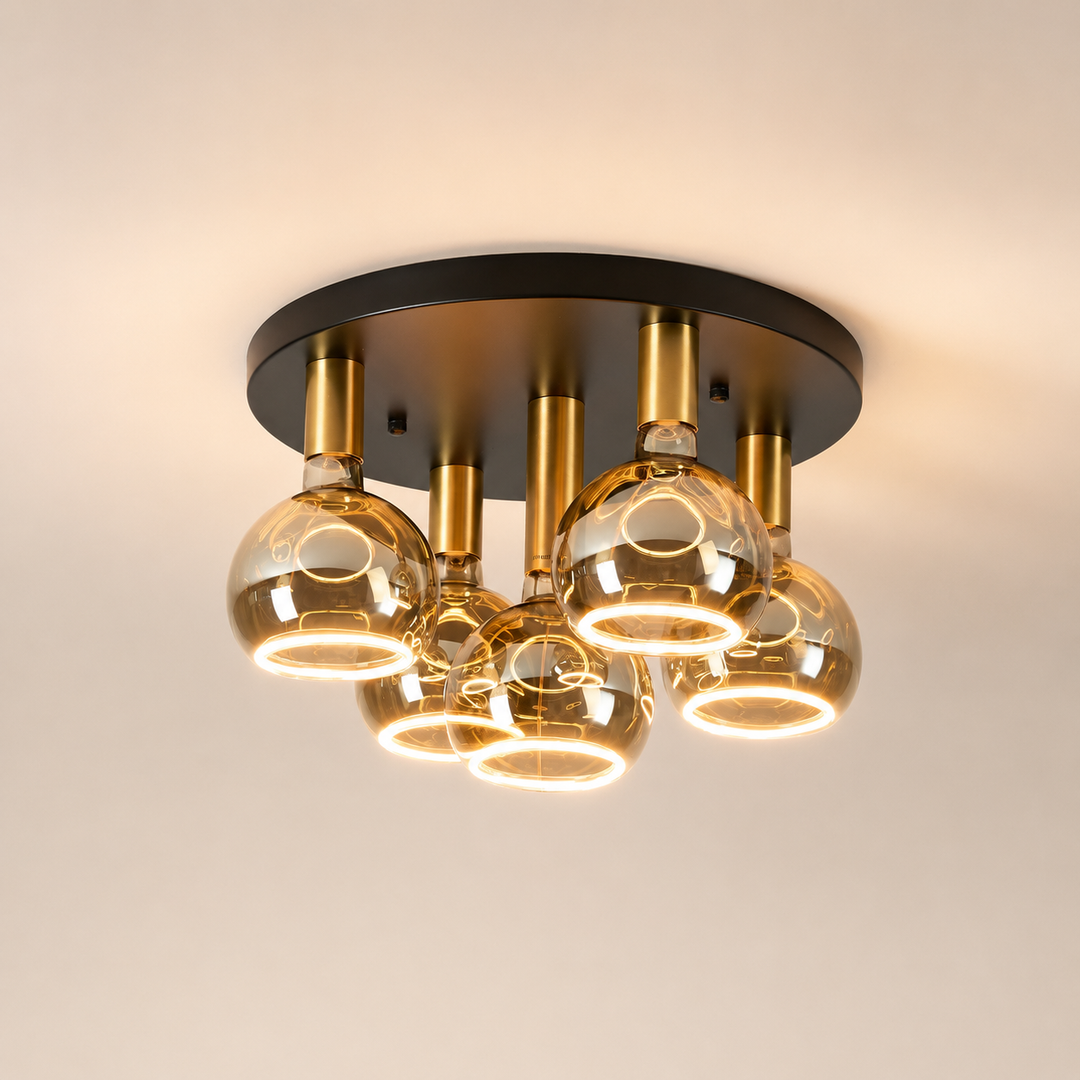 Roma 5 light flush ceiling light with smoked glass bulbs, gold holders and a dark ceiling plate in a luxury square hero image.