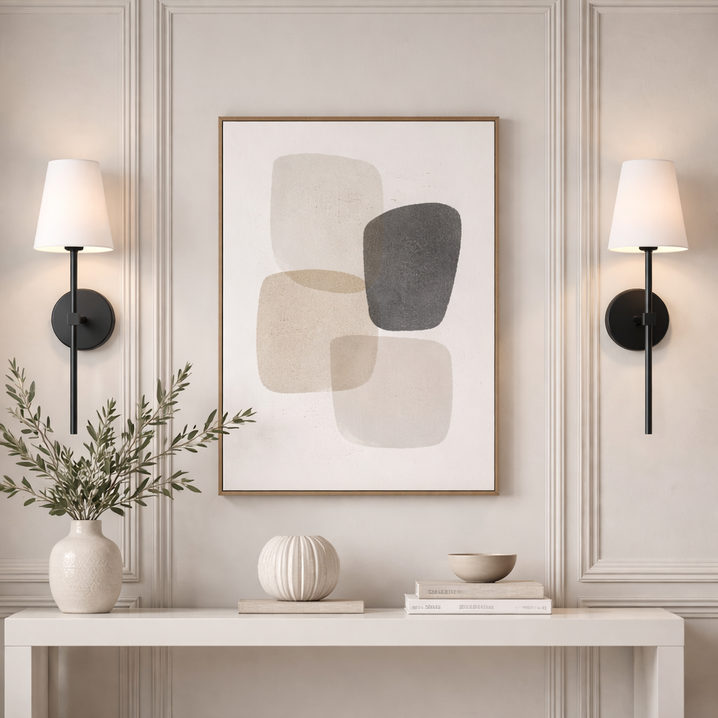 pair modern black wall lights framing artwork