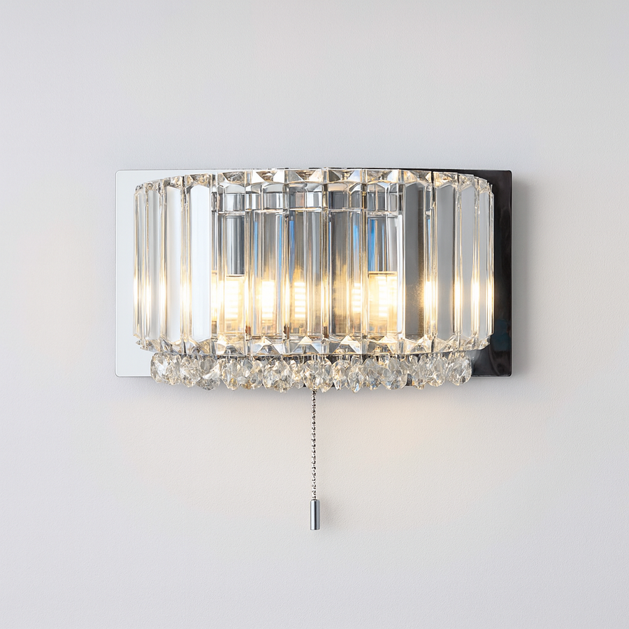Luxury Salzburg crystal wall light in chrome with faceted prisms and crystal droplets, 26cm wide x 15cm high, switched with pull chain.