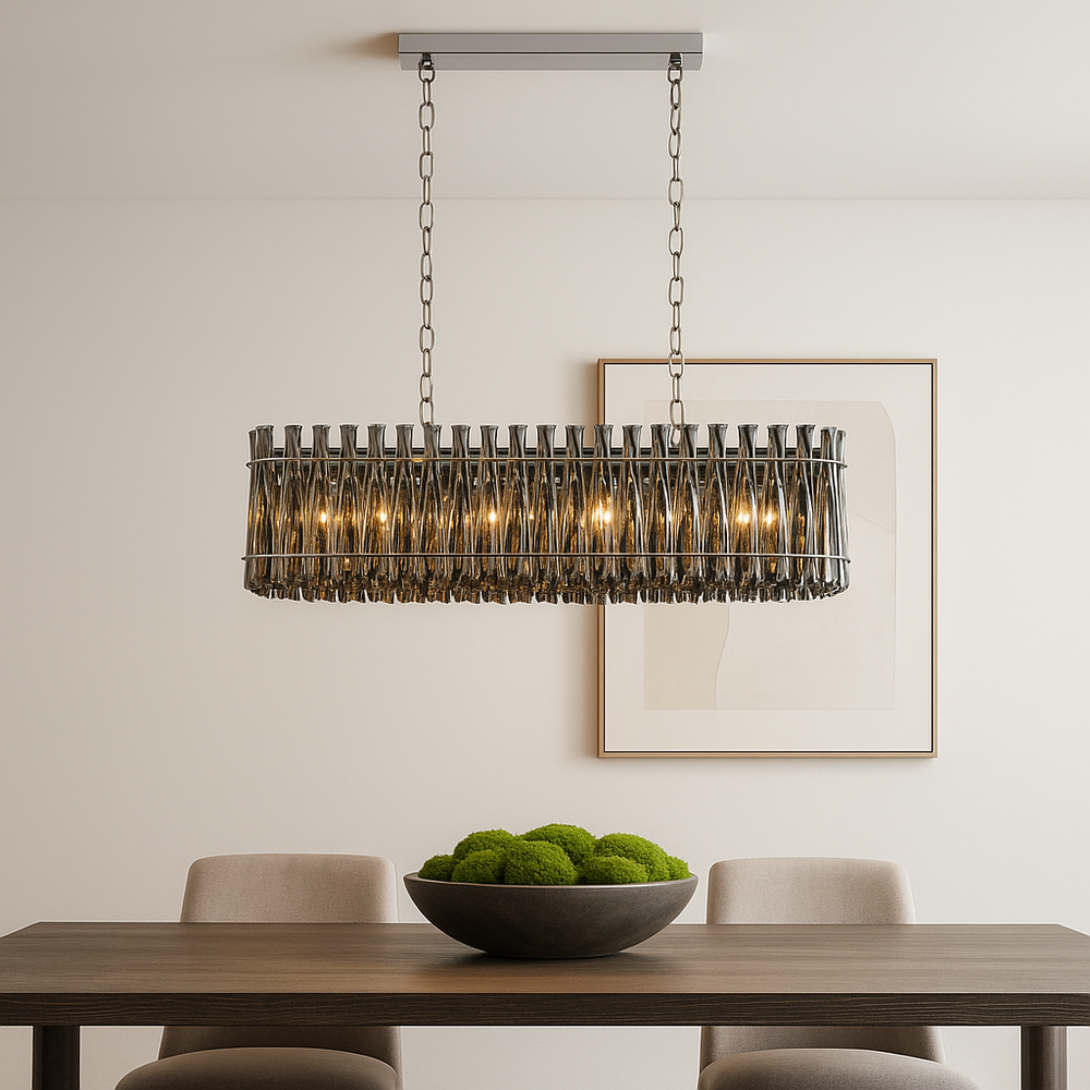 Smoked crystal silver chandelier above dining table.