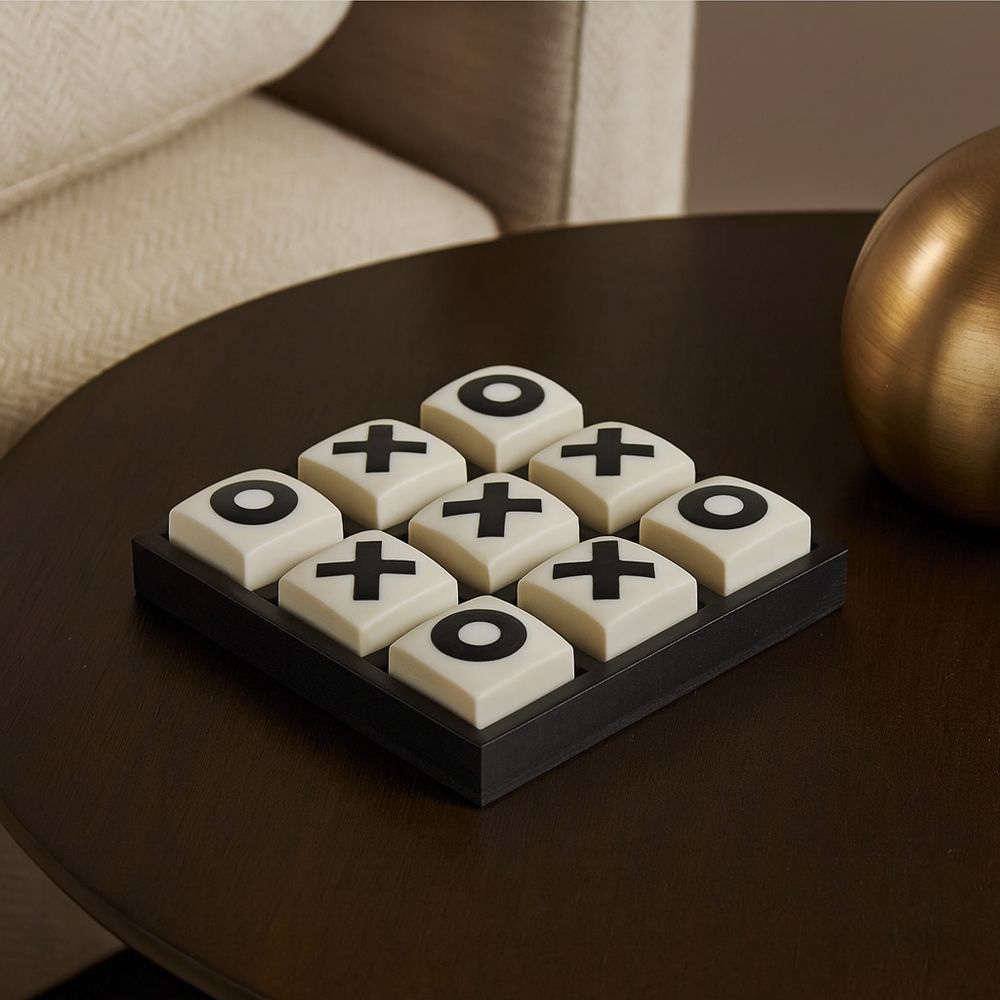 Luxury white and black tic tac toe game set styled as a small decorative accessory on a modern table
