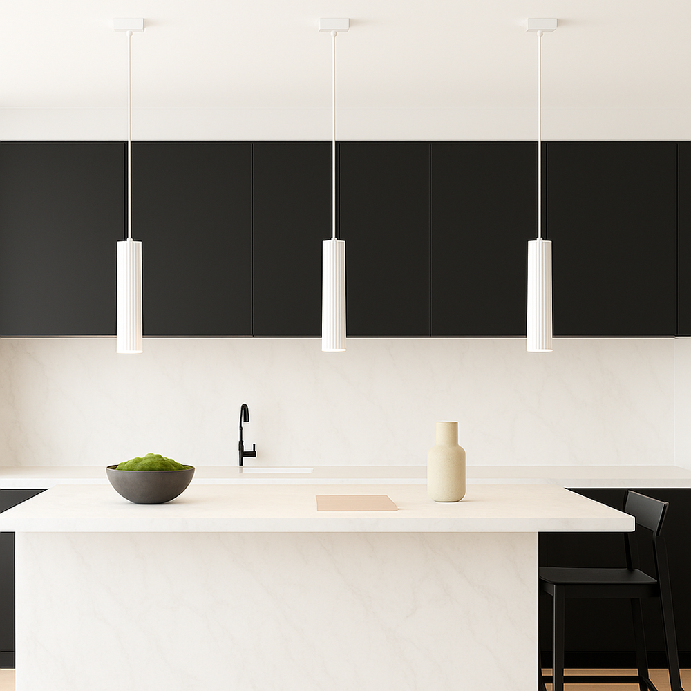 White pendants with black cabinets in marble kitchen