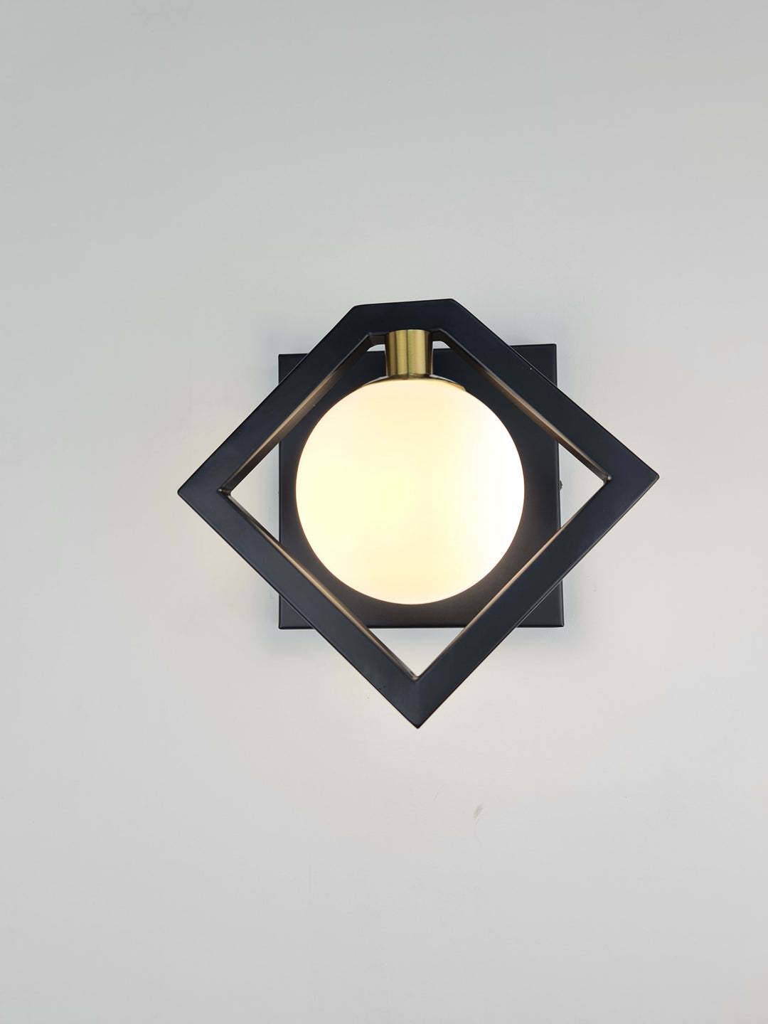 Marlow Black Wall Light With Round White Glass Shade