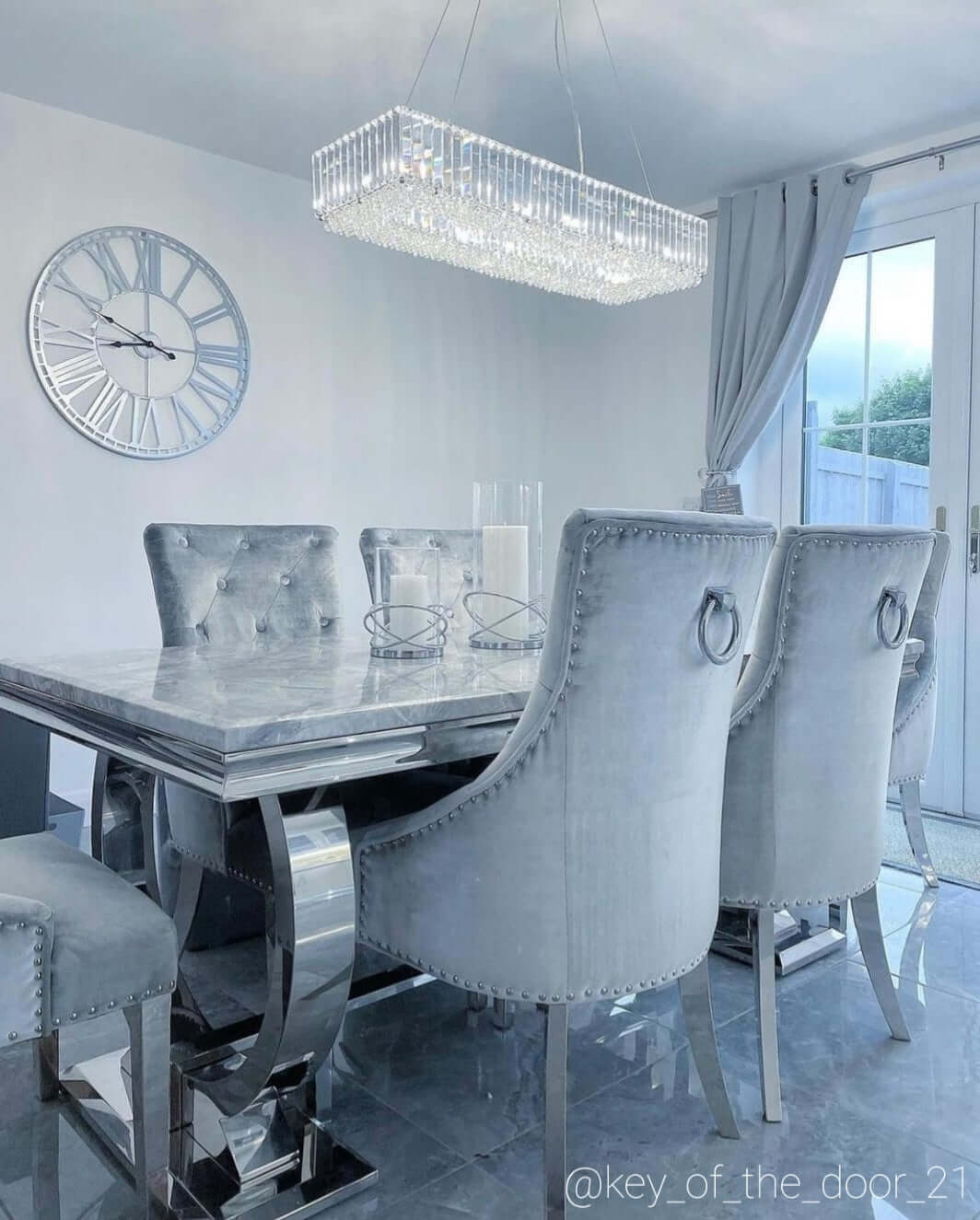 Silver chandelier dining deals room