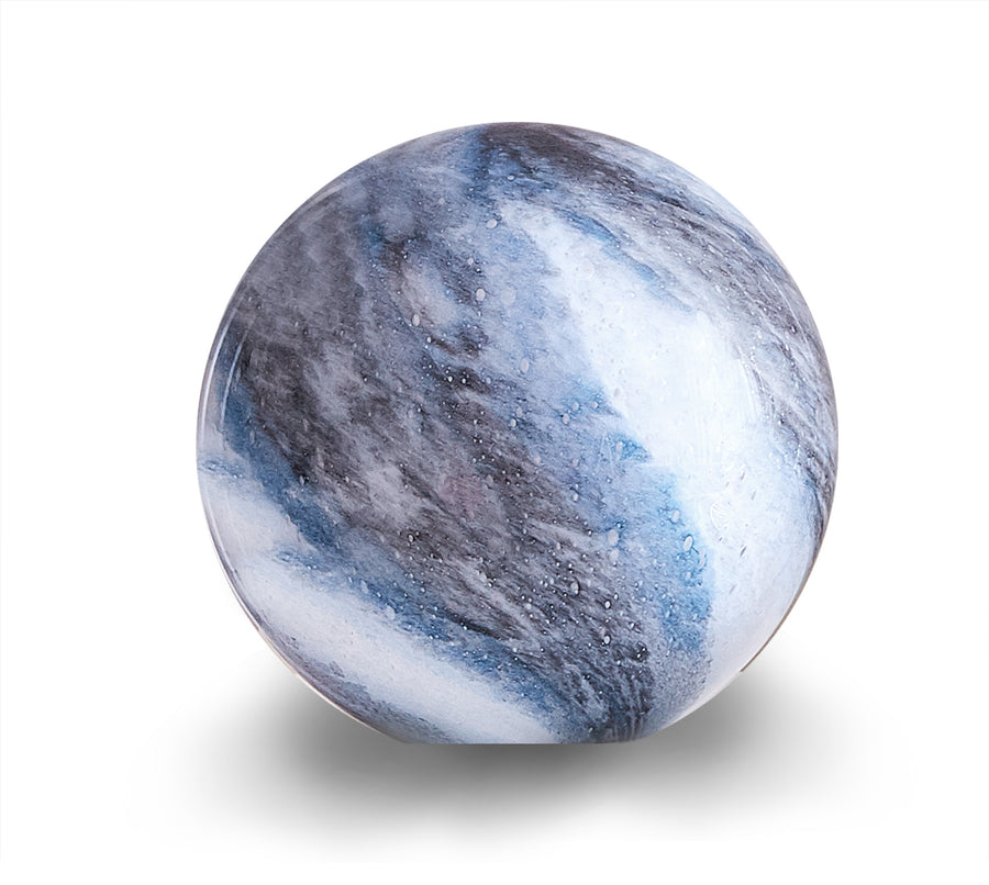 A round glass table lamp with a swirled marble design featuring blue and white tones.