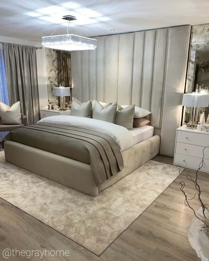 Salzburg large square chandelier in polished chrome with crystal glass blocks, positioned above a luxury upholstered bed.