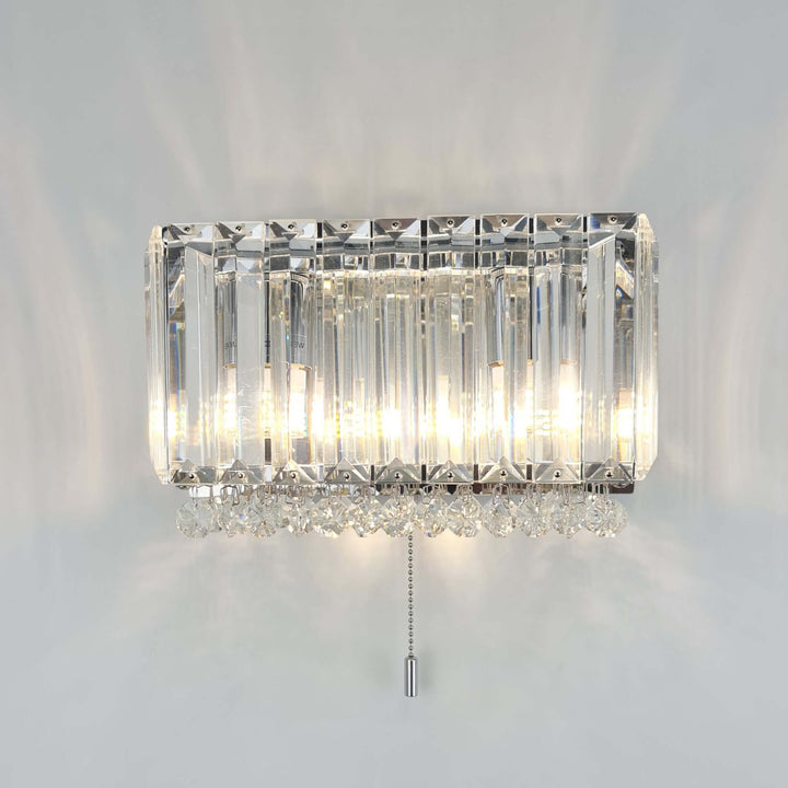 Salzburg squared wall light in polished chrome with K9 crystal blocks and crystal button detailing, modern luxury wall sconce.